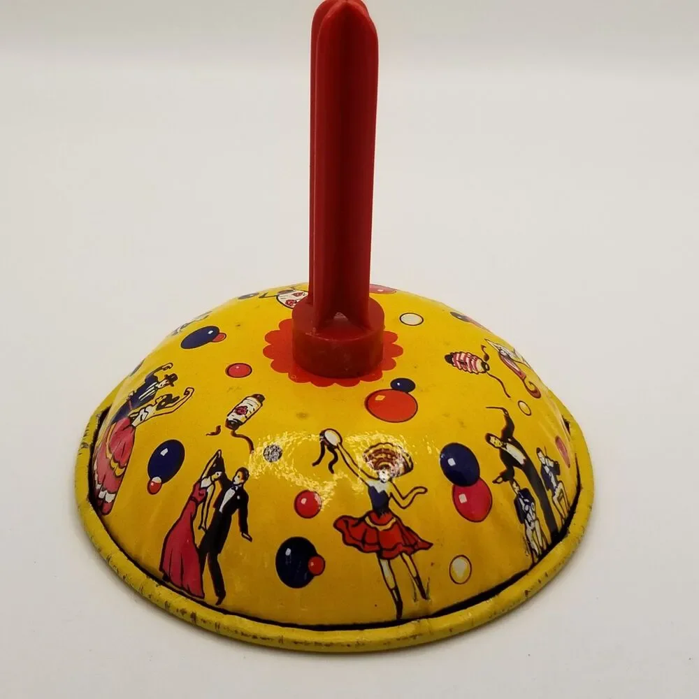 Vintage US Metal Toy Company tin art litho noisemaker bell style New Years theme